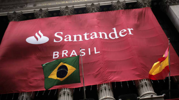 Qatar Holding vende participación en Santander Brasil con apoyo de seis despachos