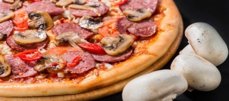 Tribunal ratifica sentencia en caso de disputa marcaria entre Dominó y Domino's Pizza en Chile