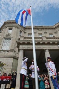 WASHINGTON, DC - JULY 20: The Cuban flag is raised in front of the country's embassy for the first time in 54 years July 20, 2015 in Washington, DC. The embassy was closed in 1961 when U.S. President Dwight Eisenhower severed diplomatic ties with the island nation after Fidel Castro took power in a Communist revolution. (Photo by Chip Somodevilla/Getty Images)